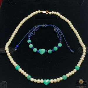 Unique and exclusive teens woman necklace and girls bracelet set handmade of Natural 5-7mm Pearls, 2 heart shape 10 Emeralds and a 18k gold plated clasp.