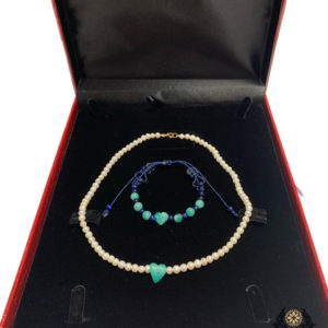 Unique and exclusive teens woman necklace and girls bracelet set handmade of Natural 5-7mm Pearls, 2 heart shape 6 Emeralds and a 18k gold plated clasp.